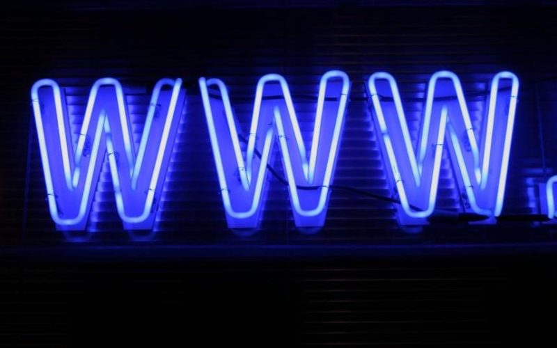 Blue neon www. logo on black background