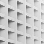 A close-up shot of a white cubby shelf